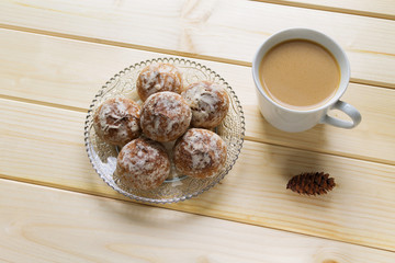 gingerbread cookies on a saucer wooden background coffee cacao tea