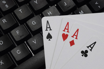 virtual casinos, real money. keyboard and playing cards