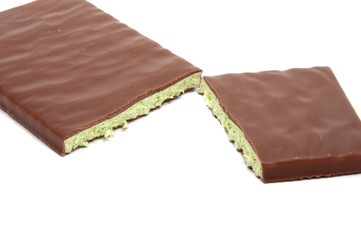 Milk chocolate with mint filling isolated on the white