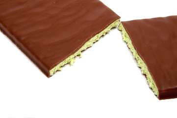 Milk chocolate with mint filling isolated on the white