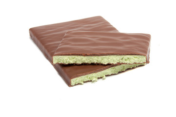 Milk chocolate with mint filling isolated on the white