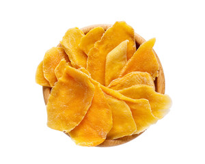 Dehydrated mango slices in a wooden bowl isolated on white. Dried fruits. Natural healthy candy.