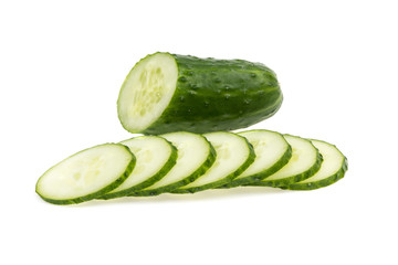 sliced green cucumber on a white background