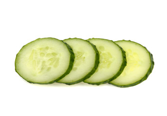 sliced fresh green cucumber on a white background