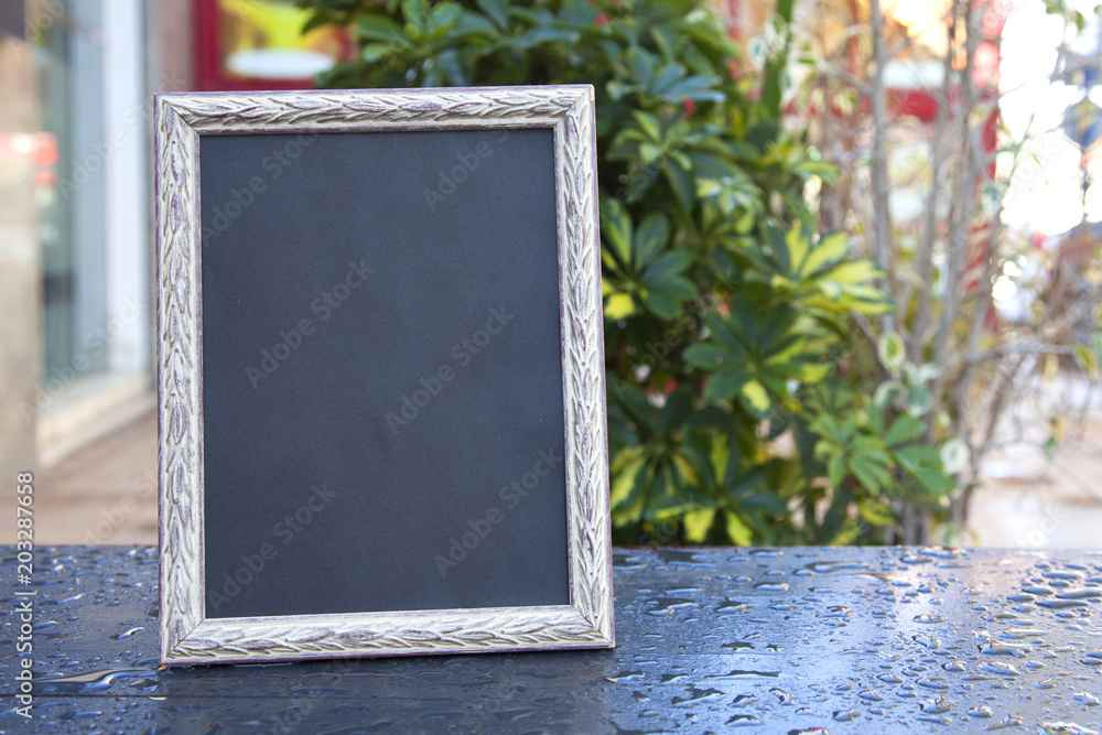 Wall mural Frame for the photo. Black background. There is a place for your inscription. Mock up.