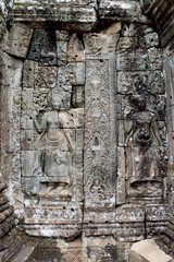 Detail of the wall of the ancient Angkor Thom Bayon Temple in the Angkor Area, near Siem Reap, Cambodia, Asia. Buddhist monastery from the 12th century. Asian architectural background.