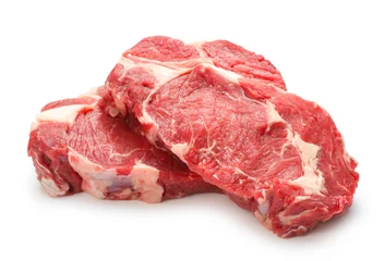 Photo sur Plexiglas Viande Steaks crus isolés sur fond blanc