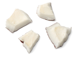 Coconut pieces isolated on white background. top view