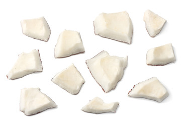 Coconut pieces isolated on white background. top view