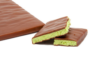 Milk chocolate with mint filling isolated on the white