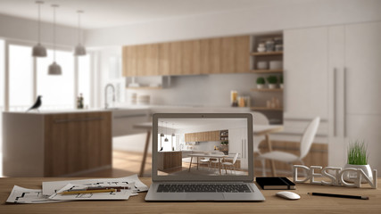 Fototapeta premium Architect designer desktop concept, laptop on wooden work desk with screen showing interior design project, blurred draft in the background, modern kitchen idea template