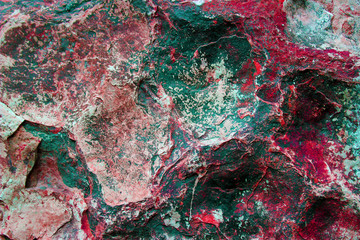 texture of gray and black stones with red splashes