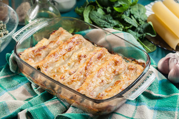 Cannelloni pasta stuffed with spinach and ricotta