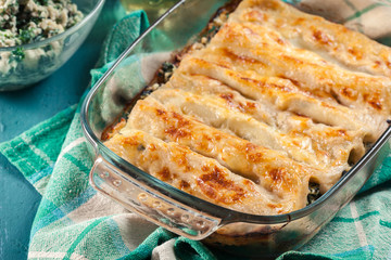 Cannelloni pasta stuffed with spinach and ricotta