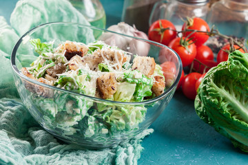 Healthy caesar salad with cheese and croutons