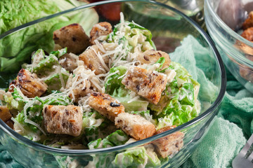 Healthy caesar salad with cheese and croutons