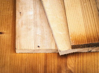 old spruce boards on top of each other