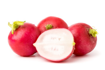 Ripe radish and half on a white background.