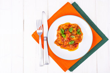 Fillet meat chicken, turkey with paprika and tomatoes