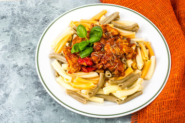 Pasta with chicken fillet, tomatoes, sweet pepper