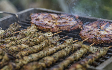 meat on a charcoal grill