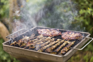 meat on a charcoal grill