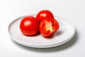 Tomato on Plate with White Background