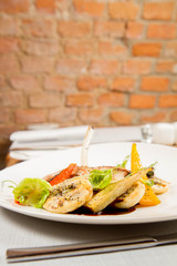 Meat dish with vegetables served in a restaurant