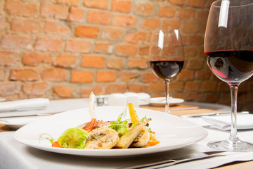 Meat dish with vegetables served in a restaurant
