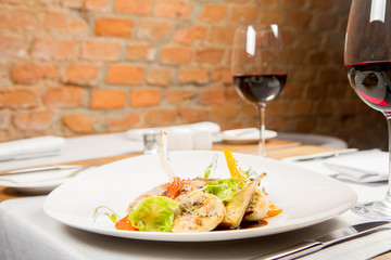 Meat dish with vegetables served in a restaurant