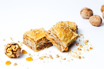 Baklava dessert slices on white background