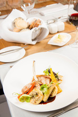 Meat dish with vegetables served in a restaurant