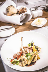 Meat dish with vegetables served in a restaurant