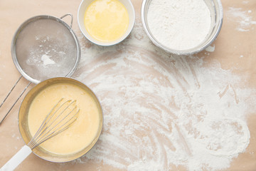 Ingridients for preparation of bakery dough on the crafted background