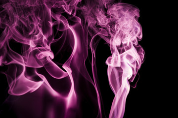 Fototapeta premium Purple smoke on black background