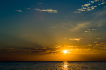 Amazing sea sunset, the sun, waves, clouds