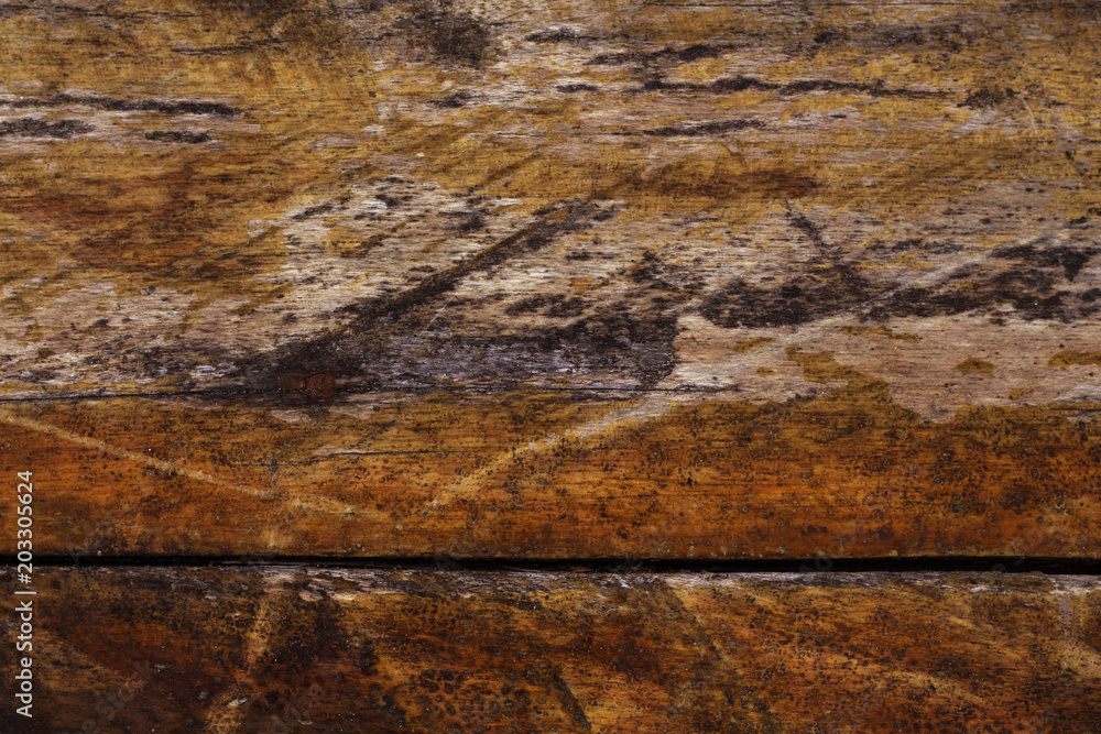 Wall mural Rough wooden surface texture. Warm brown timber texture macro photo. Natural wood background.