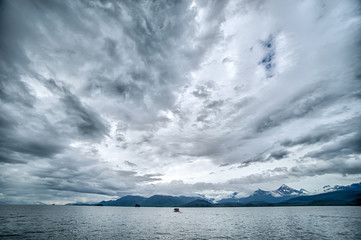 abstract cloudy waterscape AND MOUNTAIN RANGE IN ALASKA