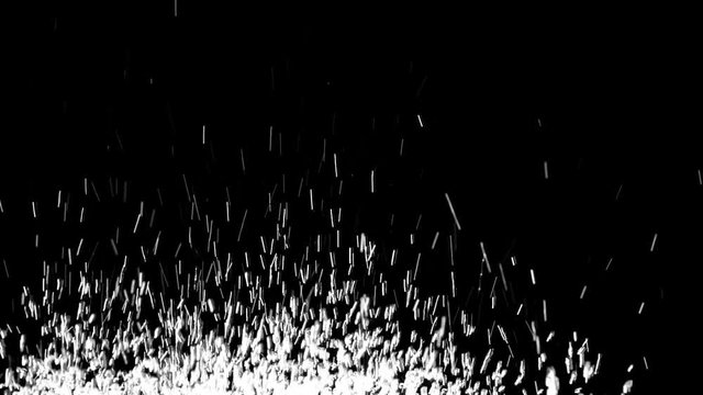 Explosive fountain of watery balls. Black background. Slow motion