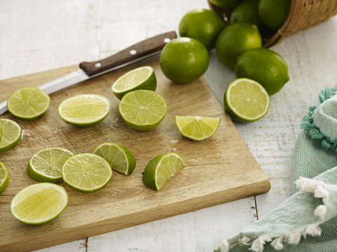 Limes on Cutting Board