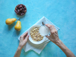 Healthy muesli with dates and fresh pears