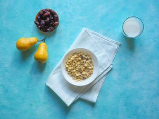Healthy muesli with dates and fresh pears