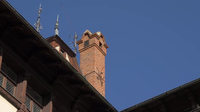 Low angle view of a brick chimney