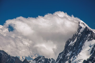 Close-up of snowy peaks and mountains, viewed from the Aiguille du Midi, near Chamonix. A famous ski resort located in Haute-Savoie Province, at the foot of Mont Blanc in the French Alps.