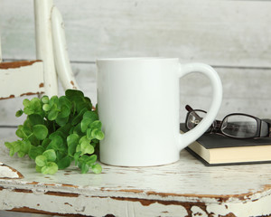 Blank white mug mockup photo with rustic wood background