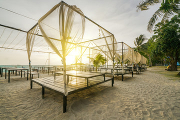 Fototapeta premium Beach bed with sunrise flare in morning time.