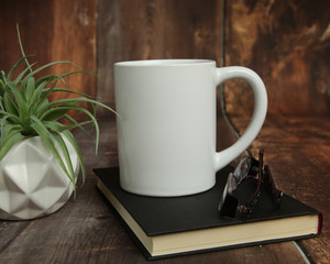 Blank white mug mockup photo with rustic wood background