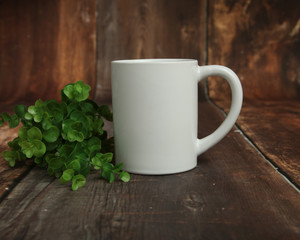 Blank white mug mockup photo with rustic wood background