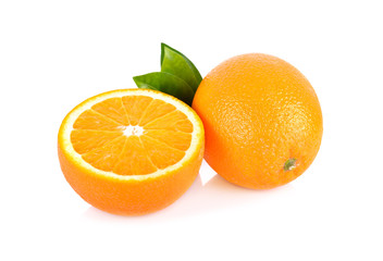 whole and half cut fresh Navel orange with leaf on white background