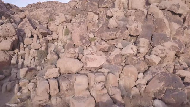 Fly over Desert rocks stones Joshua Tree